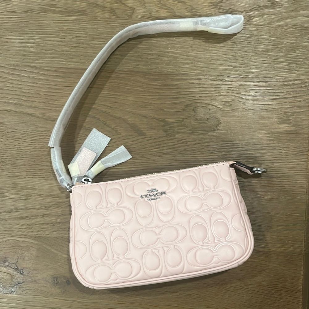 NWT new in packaging. Coach Nolita 19 in baby pink.